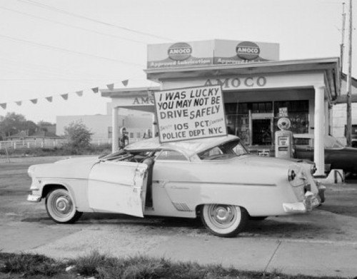 Crushed car with information board about driving safely Poster Print - Item # VARSAL255420565
