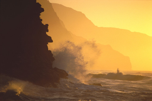 Hawaii, Kauai, Na Pali Coast At Sunset From Haena, Crashing Waves Against Rocks, Misty Yellow Sky PosterPrint - Item # VARDPI2002843