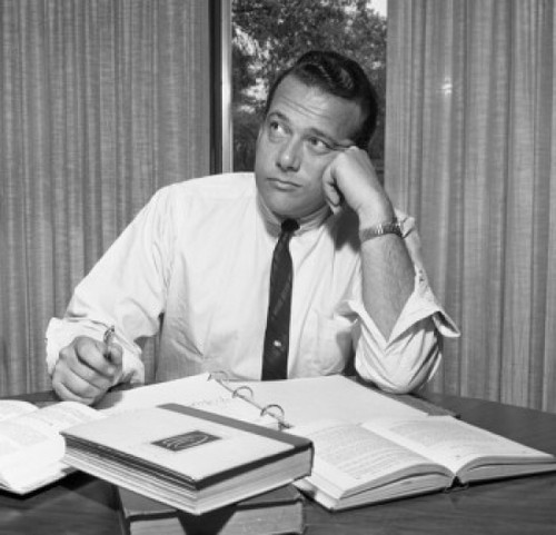 Bored businessman sitting in the office and looking away Poster Print - Item # VARSAL255417393