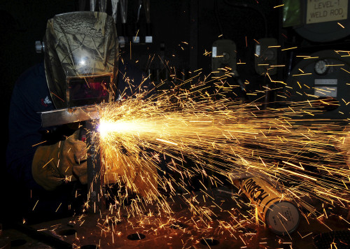 Arabian Gulf, February 9, 2012 - Hull Maintenance Technician welds scrap metal aboard the Nimitz-class aircraft carrier USS Abraham Lincoln Poster Print - Item # VARPSTSTK105279M