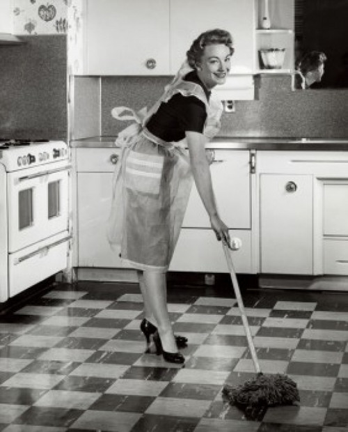 Portrait of a mid adult woman mopping the kitchen floor Poster Print - Item # VARSAL2552871