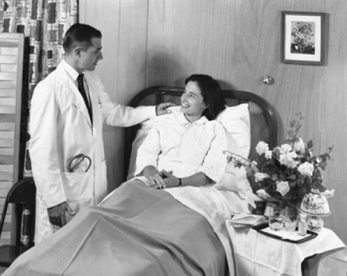 Side profile of a male doctor talking to a patient Poster Print - Item # VARSAL2558689