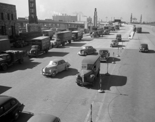 Lorries queuing near industrial building  high angle view Poster Print - Item # VARSAL255418495