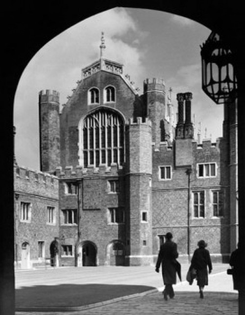Two people walking in front of a building  Great Hall  Hampton Court Palace  Middlesex  England Poster Print - Item # VARSAL9903277