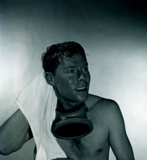Studio shot of man with gas mask drying hair with towel Poster Print - Item # VARSAL255417192