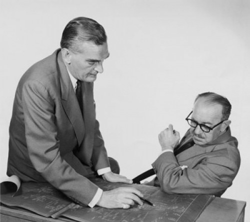 Side profile of two architects discussing on blueprint Poster Print - Item # VARSAL25548045