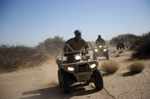 A U.S. Soldier performs off-road maneuvers with a LTATV Poster Print - Item # VARPSTSTK108805M