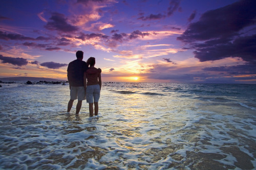 USA, Hawaii Islands, Maui, Mokapu Beach; Wailea, Couple Watching Sunset While Wading In Ocean PosterPrint - Item # VARDPI1975654