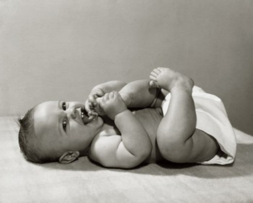 Close-up of a baby lying on the floor Poster Print - Item # VARSAL2559355