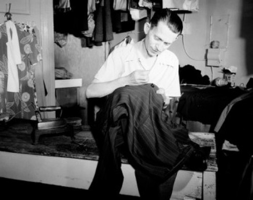 Clothes Tailor at work  front view Poster Print - Item # VARSAL255423296