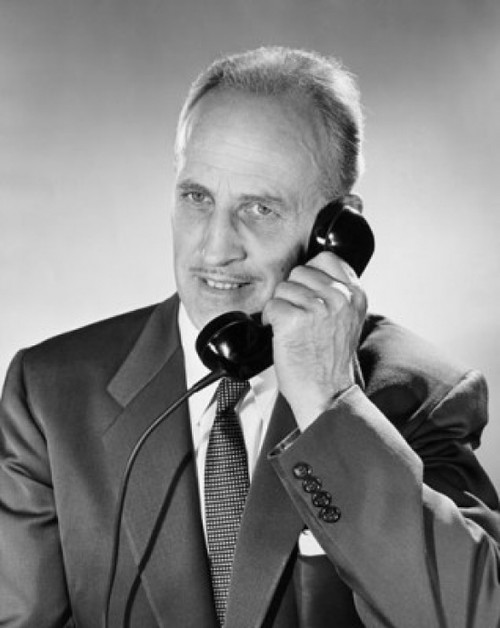 Close-up of businessman talking on the telephone Poster Print - Item # VARSAL25548275