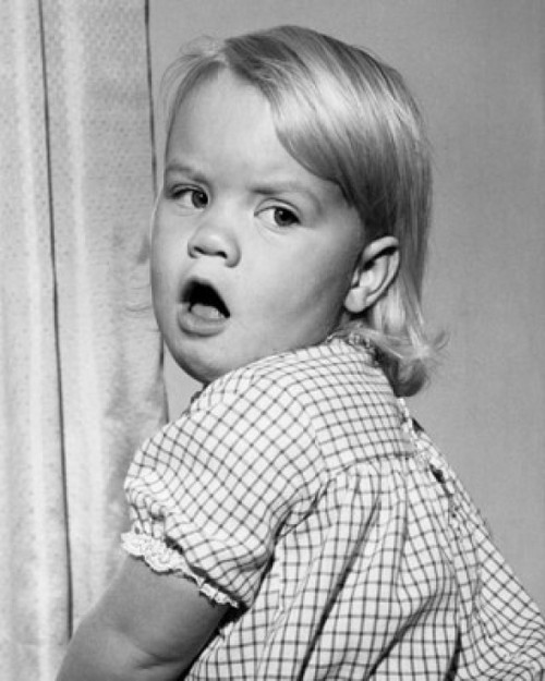 Girl looking back with her mouth open Poster Print - Item # VARSAL25514027A