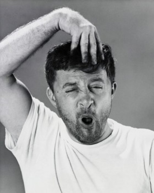 Close-up of a mid adult man suffering from a headache Poster Print - Item # VARSAL25512503