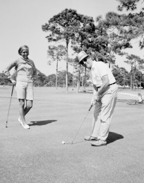 Couple playing golf Poster Print - Item # VARSAL255422431