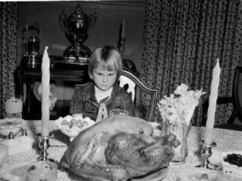 Girl praying before Thanksgiving meal Poster Print - Item # VARSAL255424928 Girl praying before Thanksgiving meal Poster Print - Item # VARSAL255424928