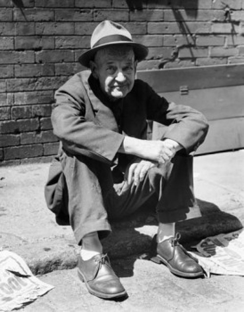 Portrait of a mature man sitting on the street Poster Print - Item # VARSAL2553761