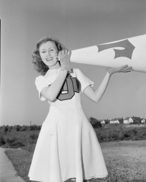 Portrait of cheerleader with megaphone Poster Print - Item # VARSAL255422371