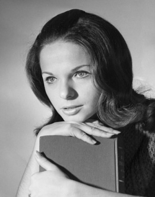 Close-up of a young woman holding a book Poster Print - Item # VARSAL25510903