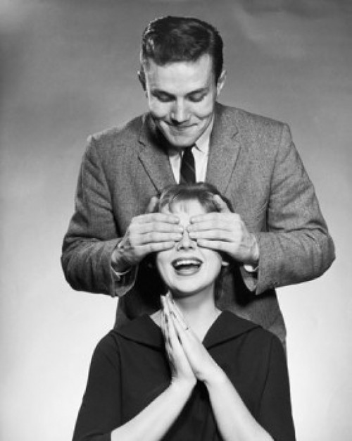 Young man covering the eyes of a young woman from behind Poster Print - Item # VARSAL2555865
