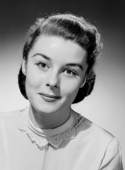 Studio portrait of young woman smiling Poster Print - Item # VARSAL255416733