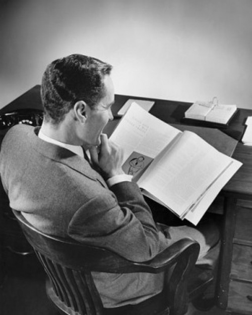 High angle view of a businessman reading a book Poster Print - Item # VARSAL25536152