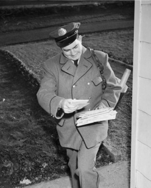 High angle view of postman delivering mail Poster Print - Item # VARSAL2555078