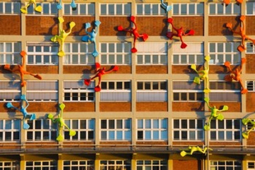 Flossies figures covering a building  Medienhafen  Dusseldorf  North Rhine Westphalia  Germany Poster Print by Panoramic Images (36 x 24) - Item # PPI138668
