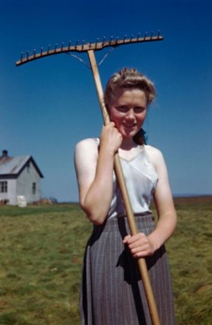 Portrait of a young woman holding a rake Poster Print - Item # VARSAL9132431