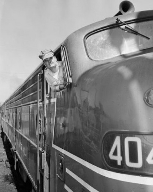 Driver looking out through the window of a passenger train Poster Print - Item # VARSAL25540816