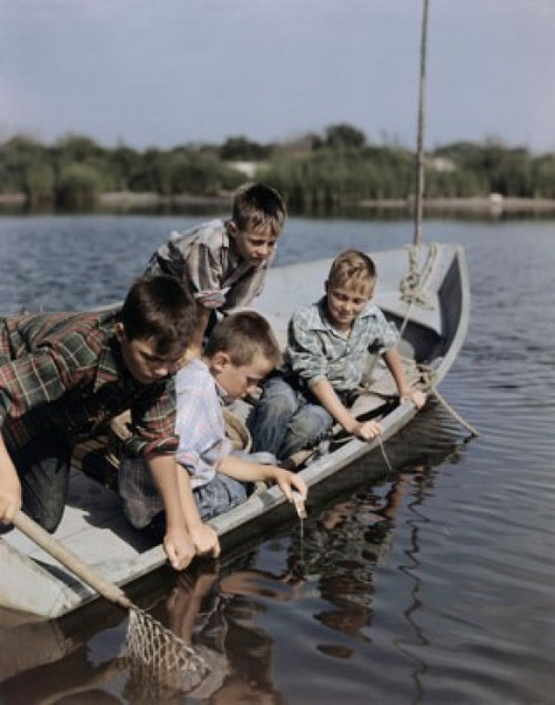 Four boys sitting in a boat and fishing Poster Print - Item # VARSAL384410683