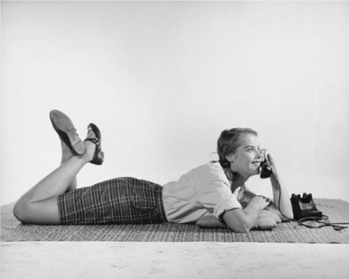 Teenage girl talking on the telephone Poster Print - Item # VARSAL2554761