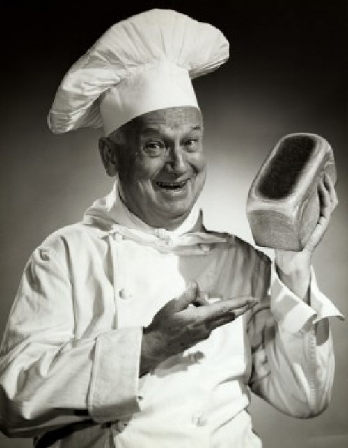 Portrait of a baker showing bread Poster Print - Item # VARSAL2556149