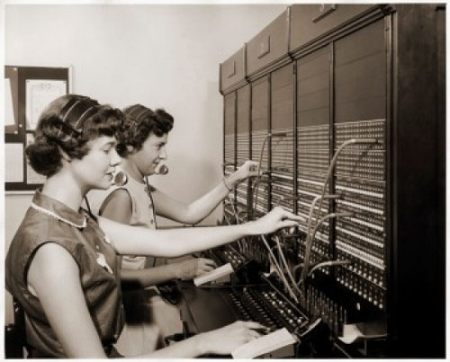 Side profile of two female telephone operators operating a switchboard Poster Print - Item # VARSAL25525132