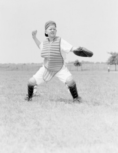 Boy playing baseball Poster Print