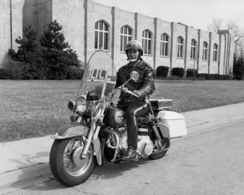 Policeman riding a motorcycle Poster Print - Item # VARSAL2557997
