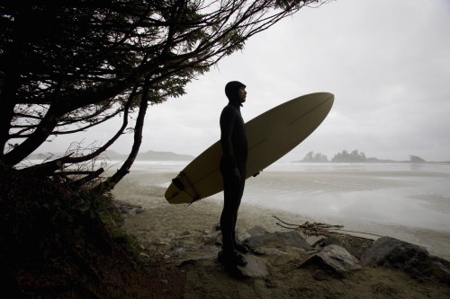 Surfer Observing Water From The Beach PosterPrint - Item # VARDPI1797437