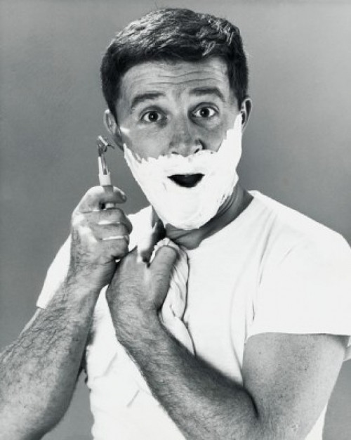Close-up of a young man shaving Poster Print - Item # VARSAL25527356
