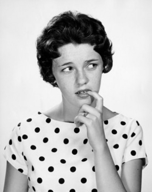 Close-up of a young woman biting her nails Poster Print - Item # VARSAL25510931 Close-up of a young woman biting her nails Poster Print - Item # VARSAL25510931