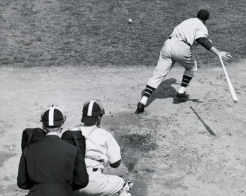 Rear view of a batter running after hitting the ball with a catcher and an umpire standing behind him Poster Print - Item # VARSAL2551219