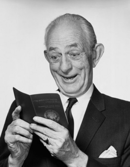 Close-up of a senior man looking at a bankbook and smiling Poster Print - Item # VARSAL25534398