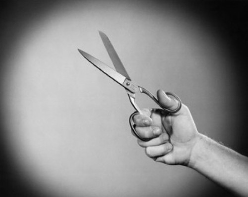 Person's hand holding scissors Poster Print - Item # VARSAL25549741