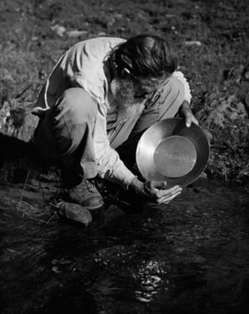 High angle view of a miner panning for gold Poster Print - Item # VARSAL2553735