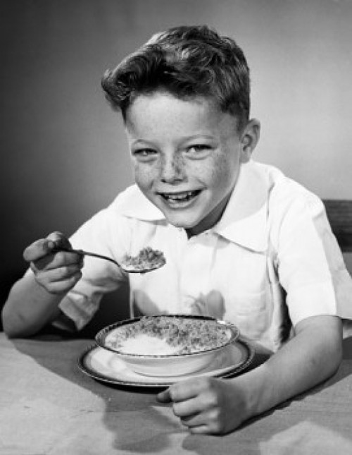 Portrait of a boy having breakfast Poster Print - Item # VARSAL2553212