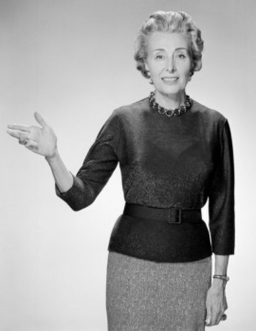 Gesturing mature woman  studio shot Poster Print