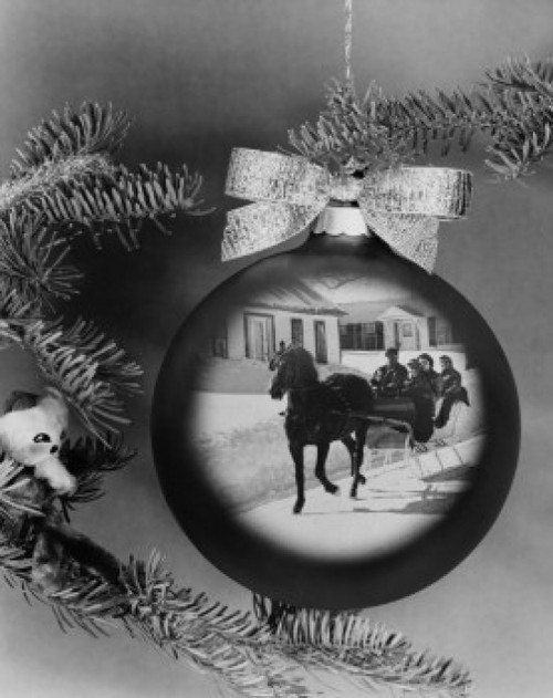 Close-up of a horsedrawn sleigh superimposed on a Christmas ornament Poster Print