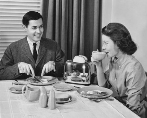 Mid adult couple eating breakfast Poster Print - Item # VARSAL2552974
