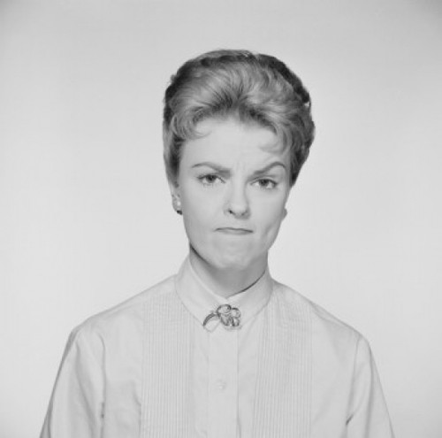 Studio portrait of woman frowning Poster Print - Item # VARSAL255422441A