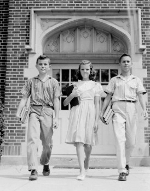 School children walking and holding books Poster Print - Item # VARSAL255421679