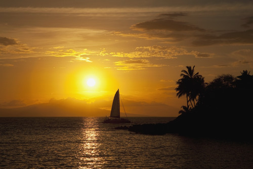 Hawaii, Maui, Makena, A silhouette of a sailboat at sunset. PosterPrint - Item # VARDPI2116611