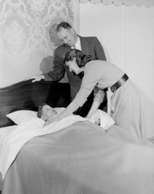 Parents in bedroom with son resting Poster Print - Item # VARSAL255422205